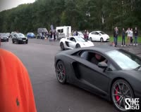 waptrick.one Drag Race - McLaren 12C vs Lamborghini Aventador at Vmax Quicksilver
