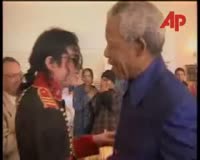 waptrick.com Michael Jackson attends Nelson Mandelas Private Birthday Party 1996