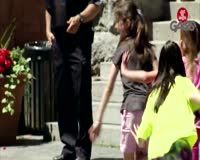 waptrick.one Stranger Giving Candy to Children
