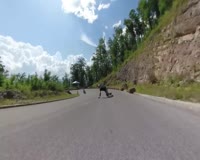 waptrick.com Women is Downhill Longboarding at Full Speed