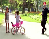 waptrick.com Little Girl Beats Cop with His Own Baton