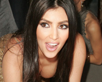 Kim Kardashian Bends Over Exposing Cleavage